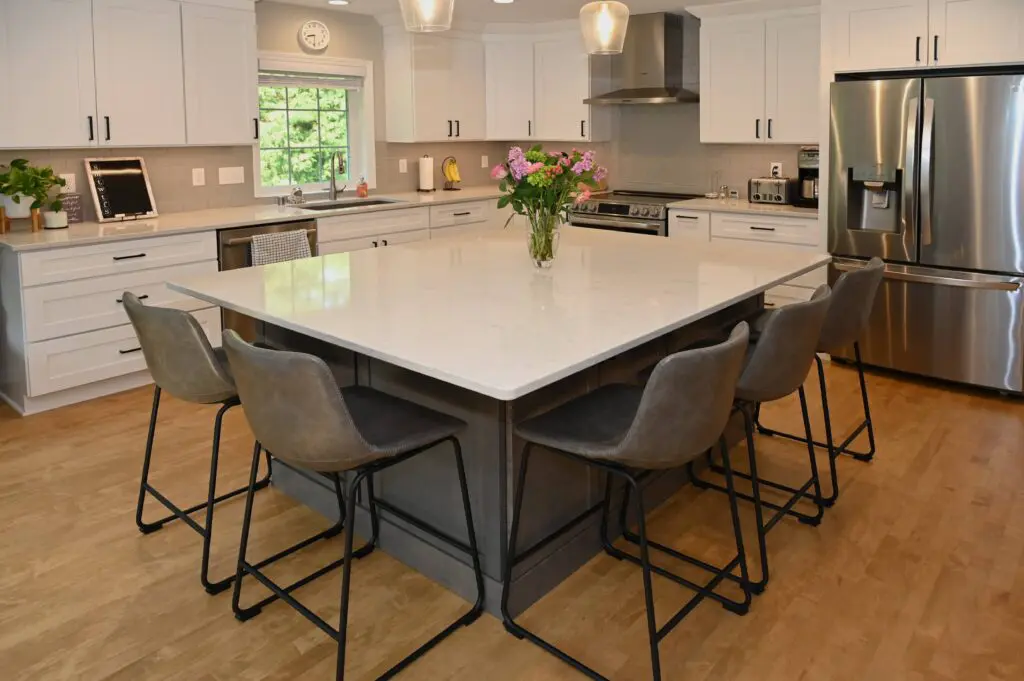Home addition for a kitchen expansion with larger island, and first-floor remodel in Hartland, Wisconsin.